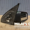 Starší zrcátko Opel Astra